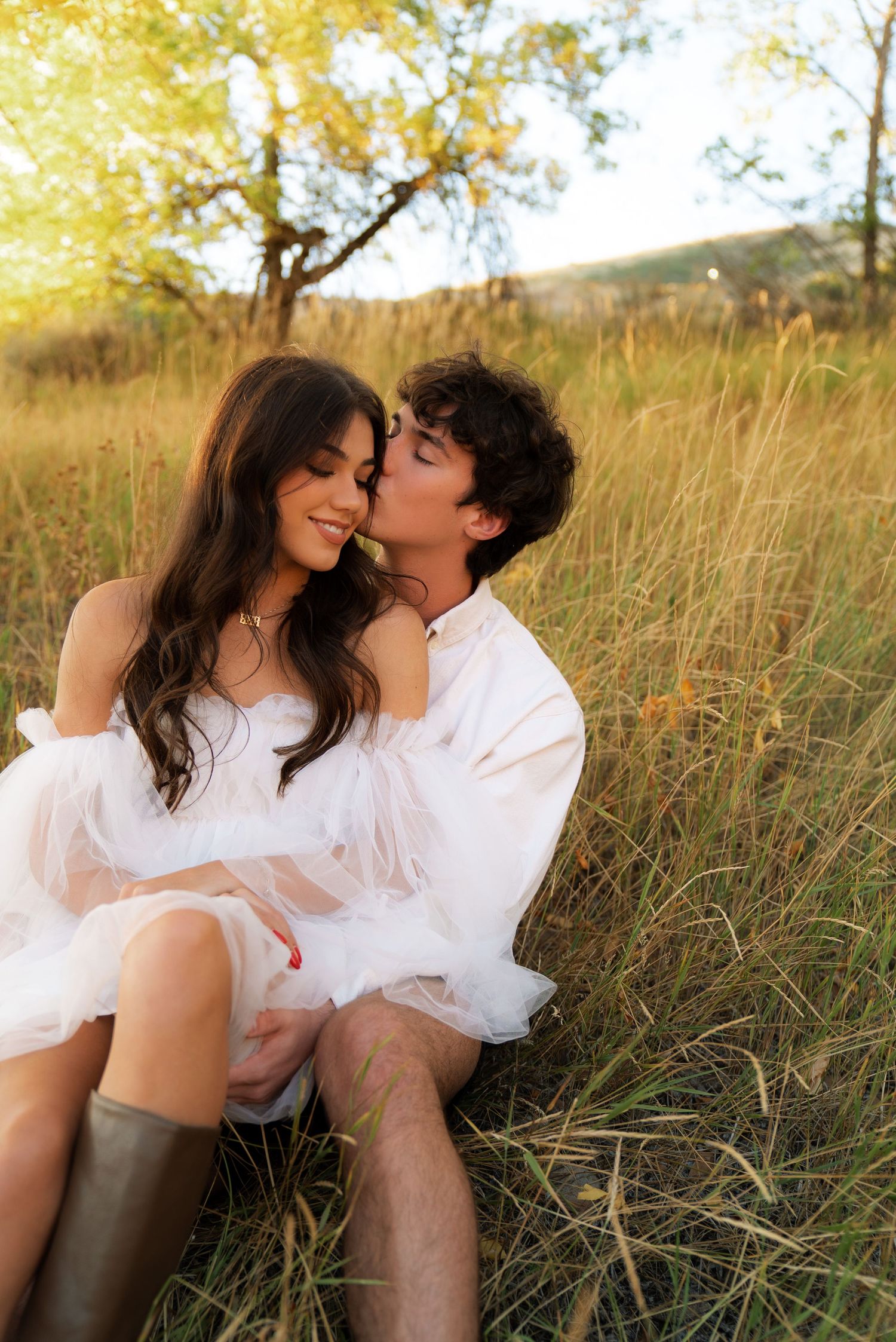 Elegant Engagement Session with Influencer Meghan Muise and Sam Thomas at North Carolina Park in pampas grass