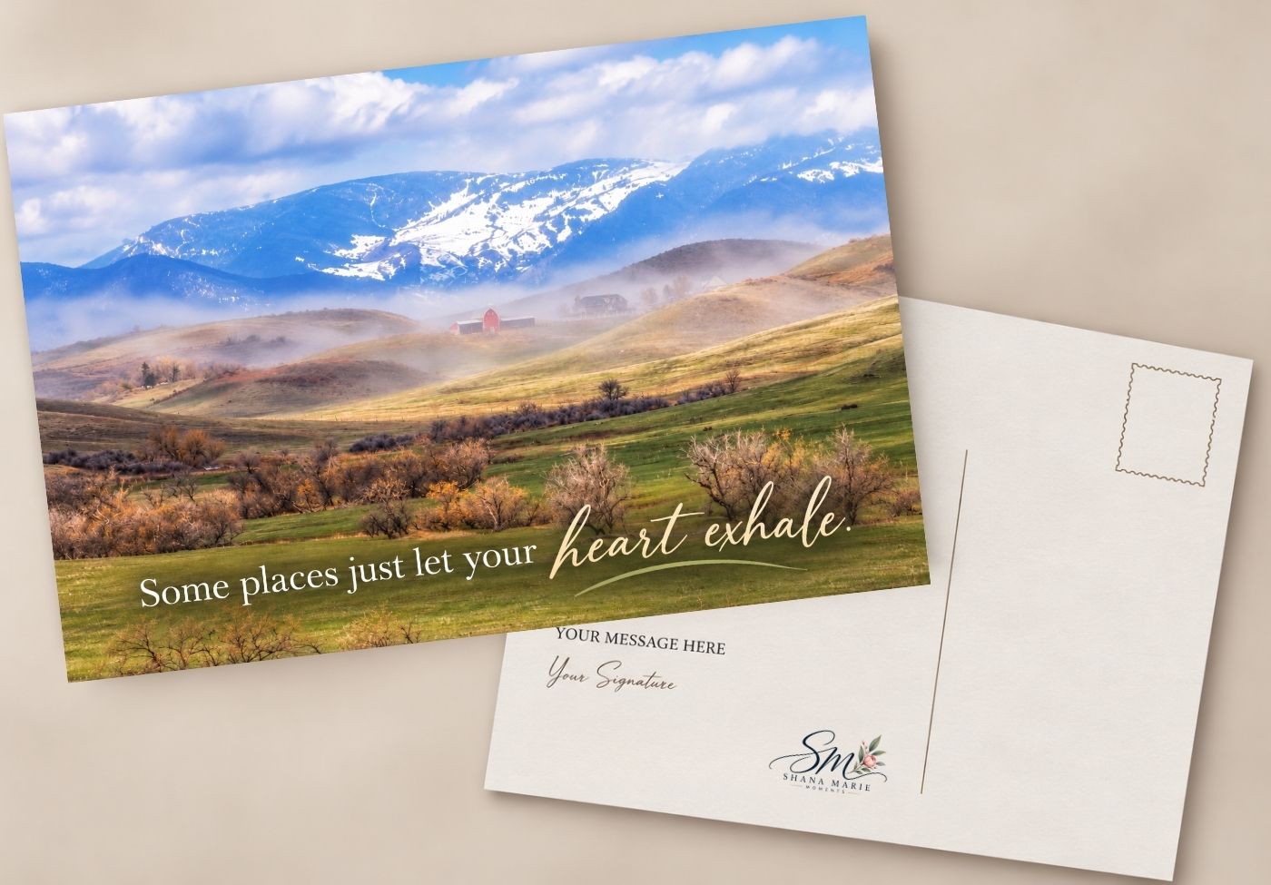 Postcard featuring a scenic mountain landscape with the quote Some places just let your heart exhale.