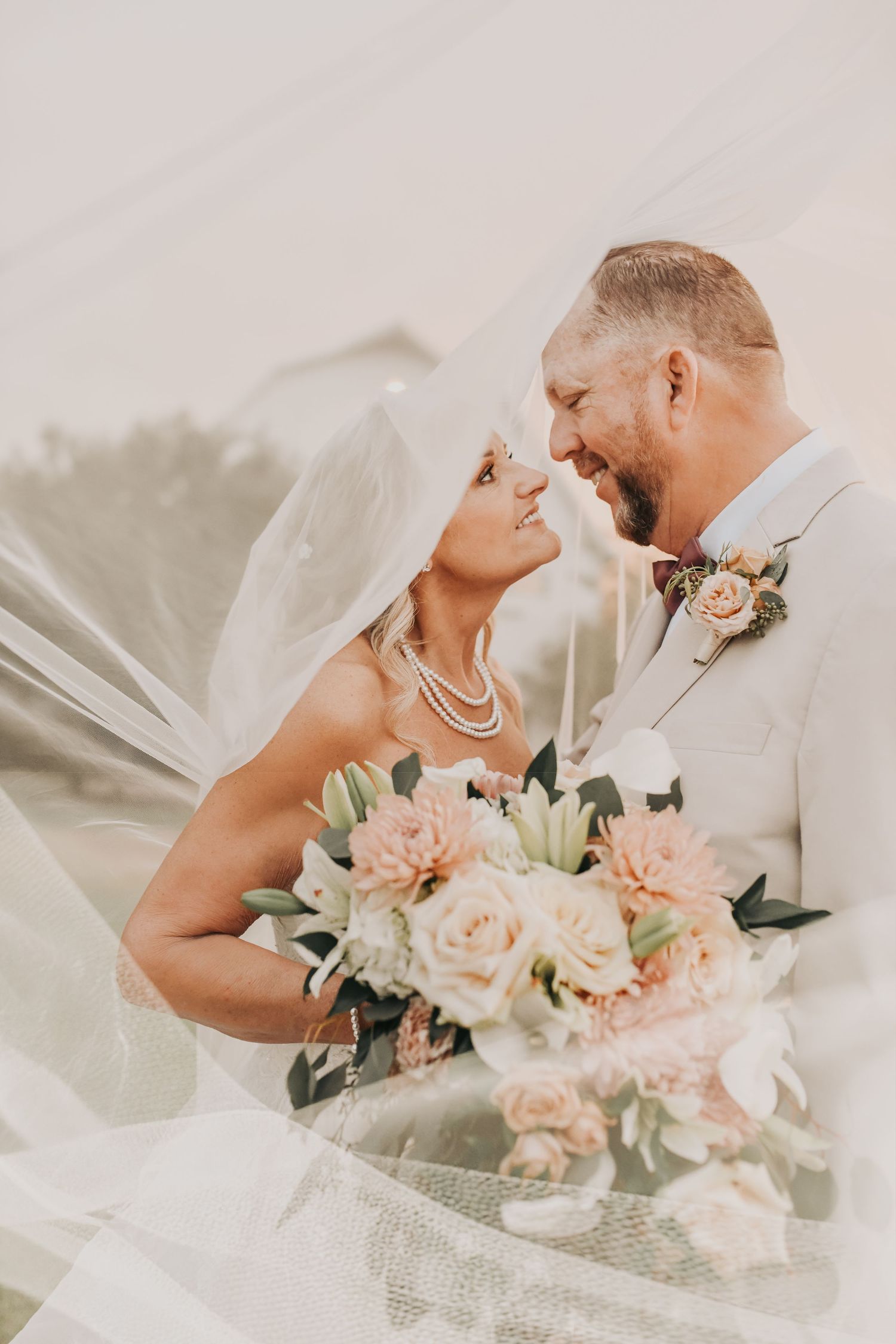 North Texas fall wedding portraits outside the iconic white chapel at The White Sparrow