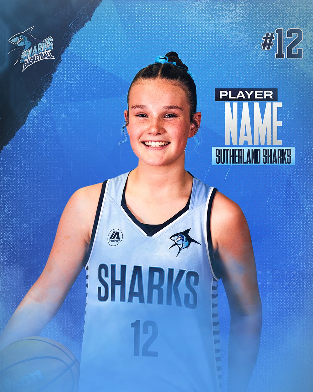 Young female basketball player in Sutherland Sharks jersey #12 poses for official team photo on blue background.