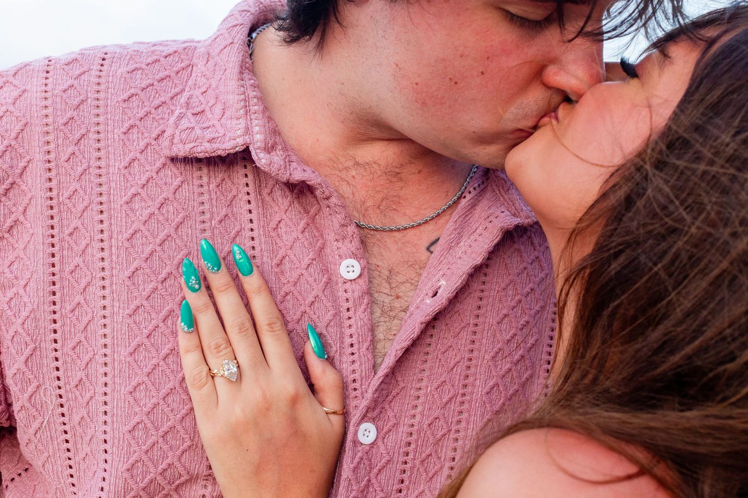 Couples portrait on the beach. Close-up shot of engagement ring. Río Grande, Puerto Rico.