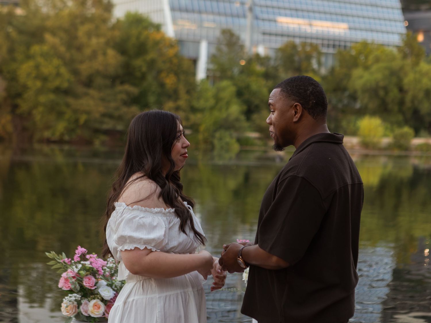 Couple gazing at each other during proposal at Butler Metro Park.