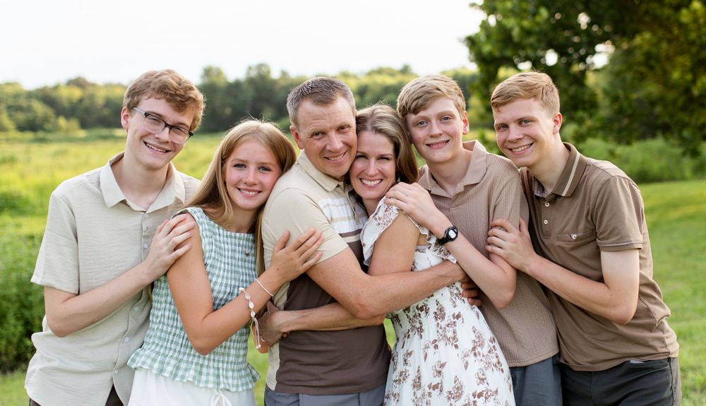 happy kids and parents in family photos st charles mo