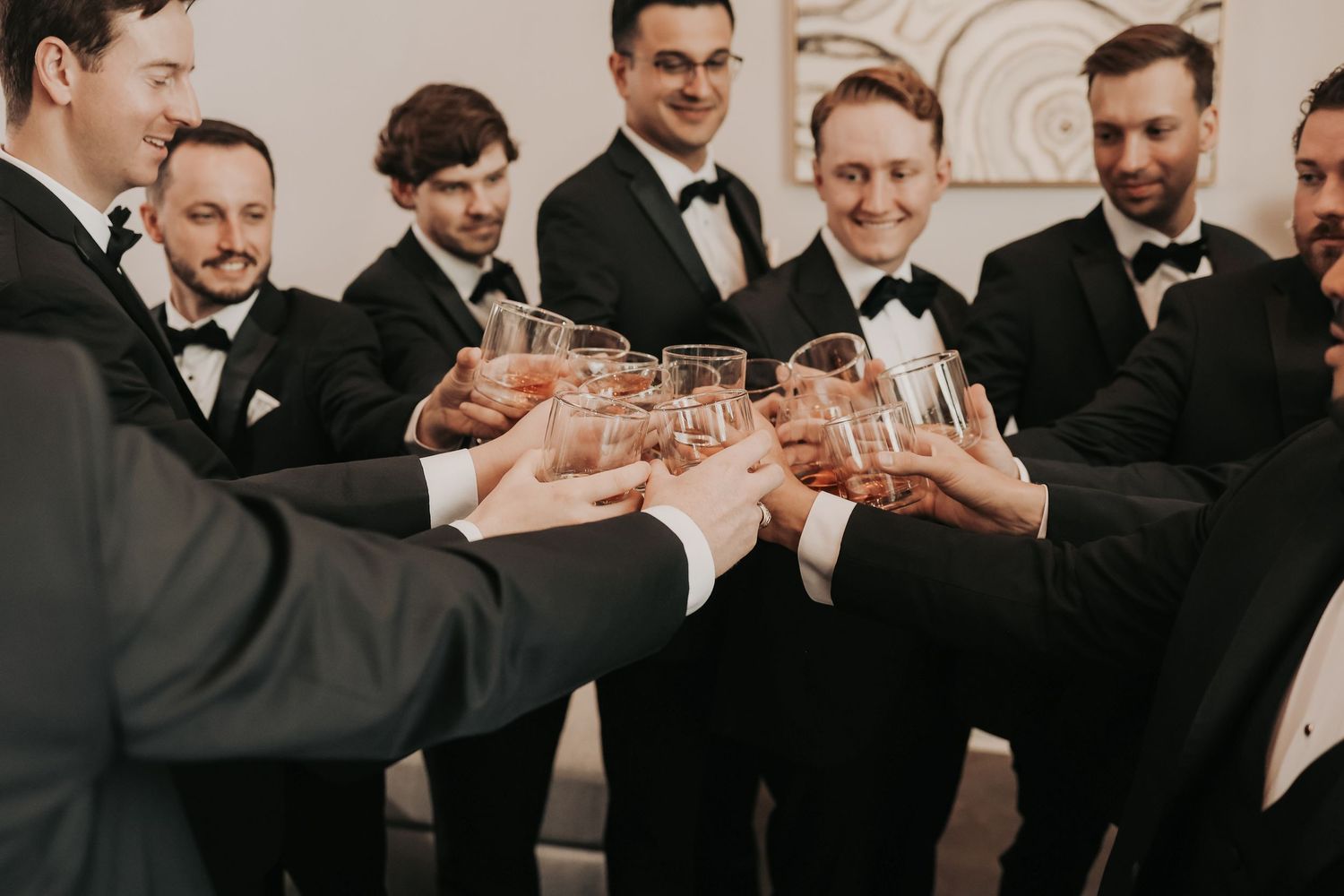 Groom preparing for a black-tie Catholic wedding in Dallas Texas