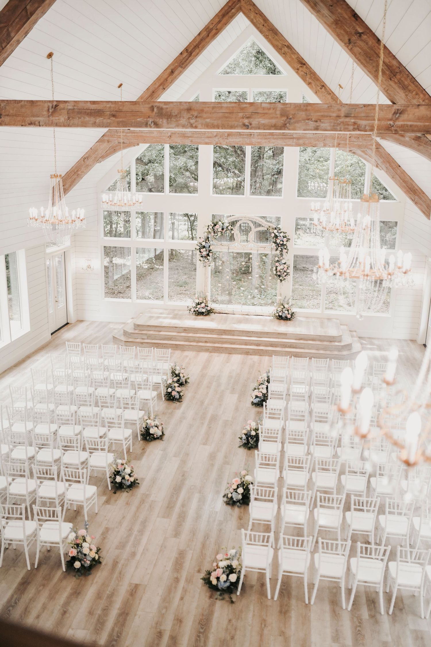 North Texas wedding ceremony featuring blush pink, dusty blue, yellow and ivory flowers
