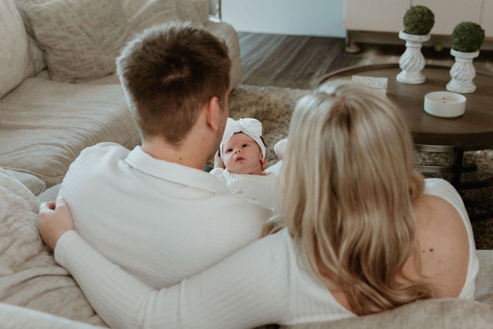 POV parent shot with newborn during in home lifestyle session with Tyler Tx  newborn photographer