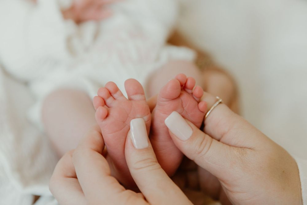 detail shots of newborn during in home lifestyle session with Tyler Tx Motherhood Newborn Photographer