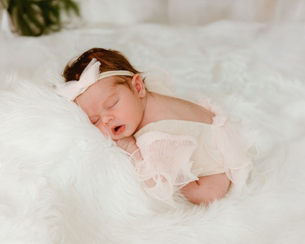 Baby only image during in home newborn lifestyle photography session using natural window light Tyler Tx Newborn Motherhood photographer