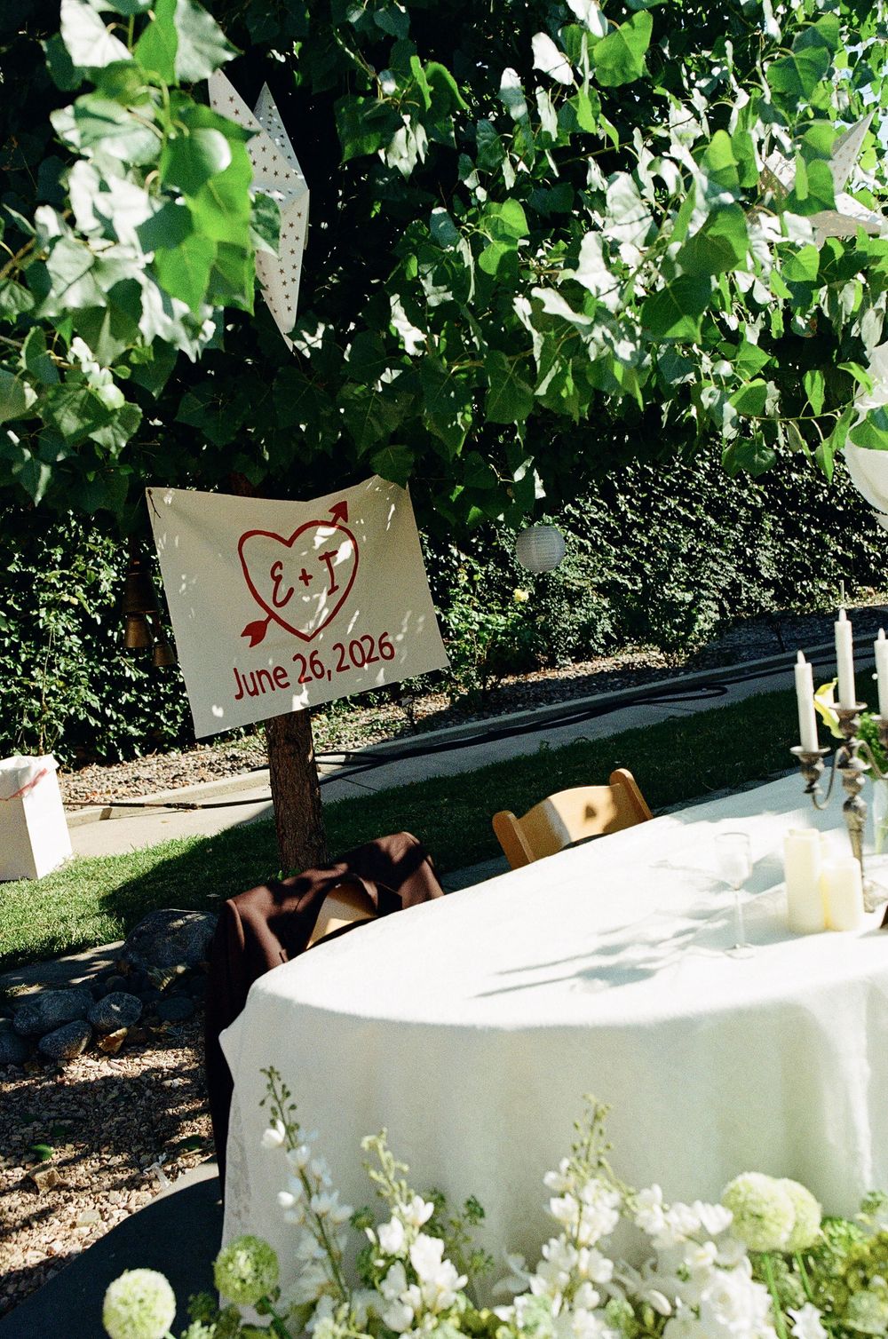 Wedding photographer in Highland Park shares film wedding photos of backyard wedding reception.