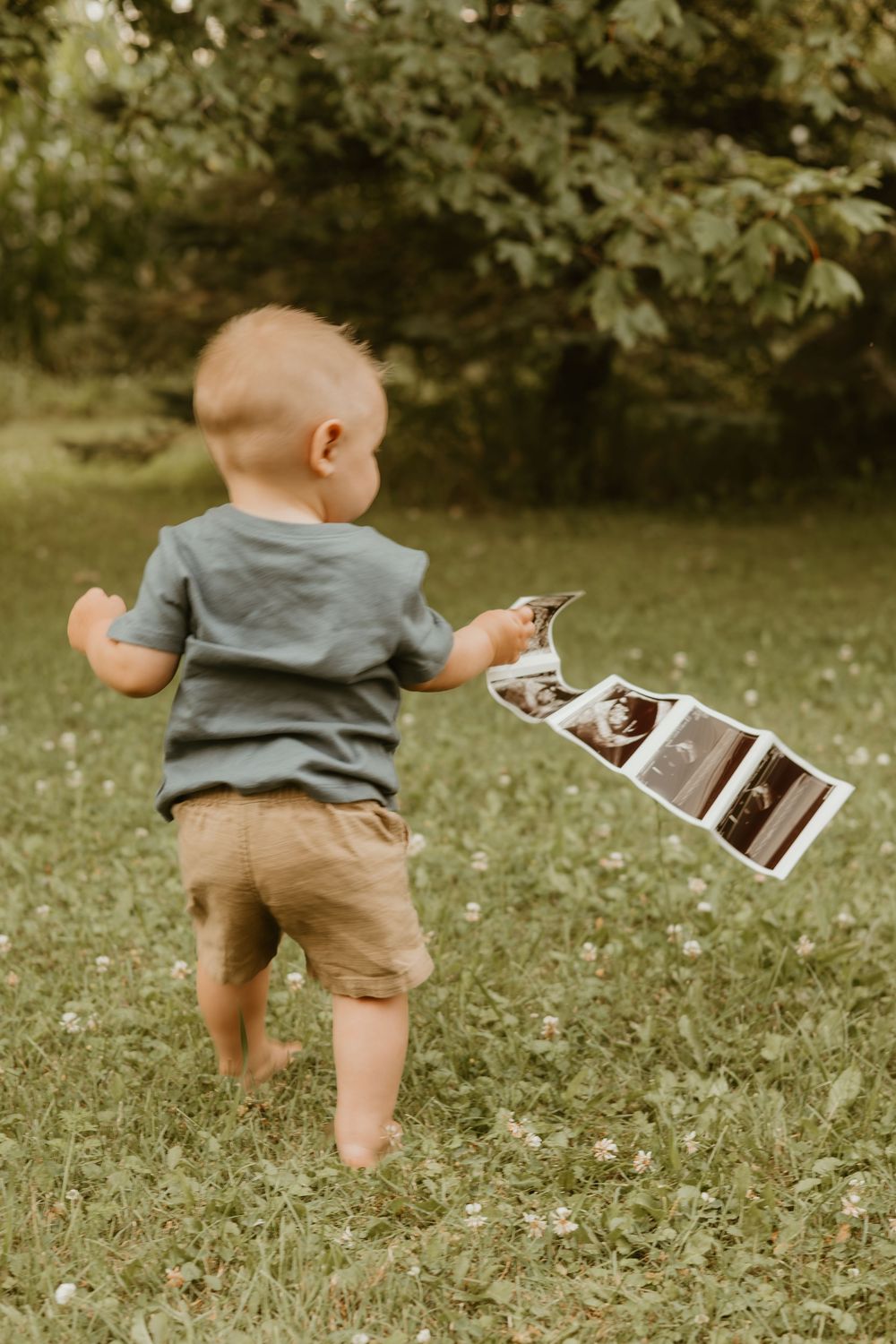 brother holding ultrasound