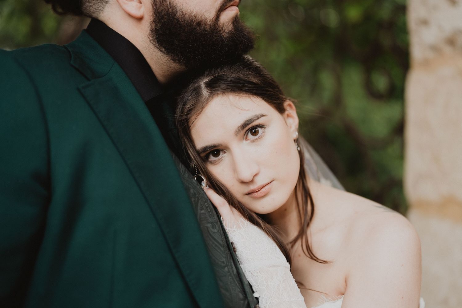 Ella resting her cheek on Harrison's shoulder