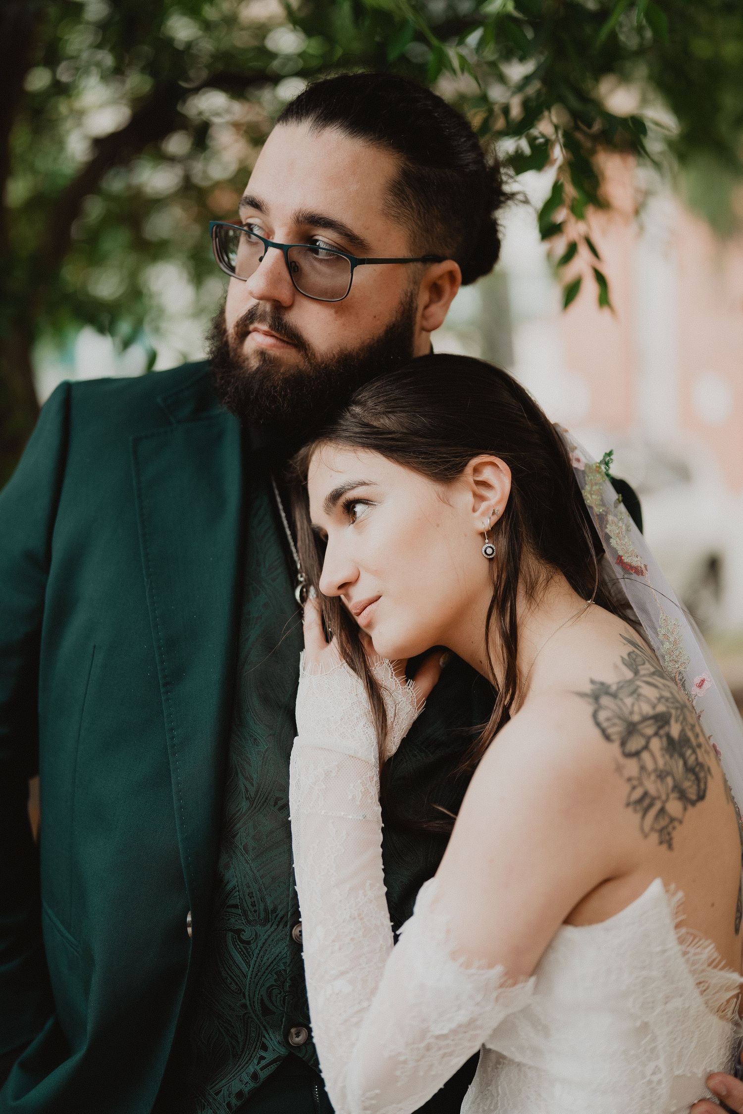 Ella leaning into Harrison, close up wedding portrait
