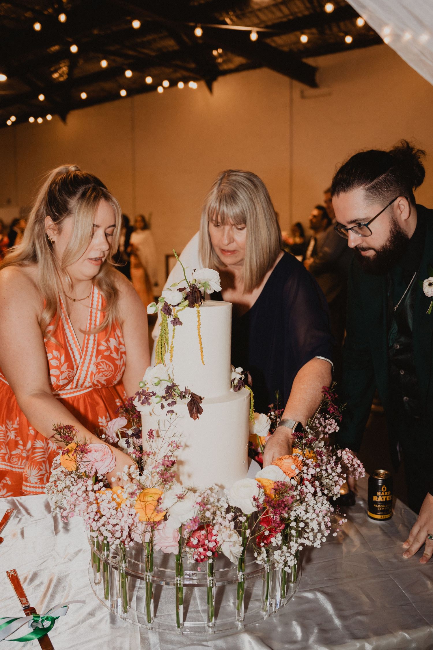 Cutting the wedding cake at the reception