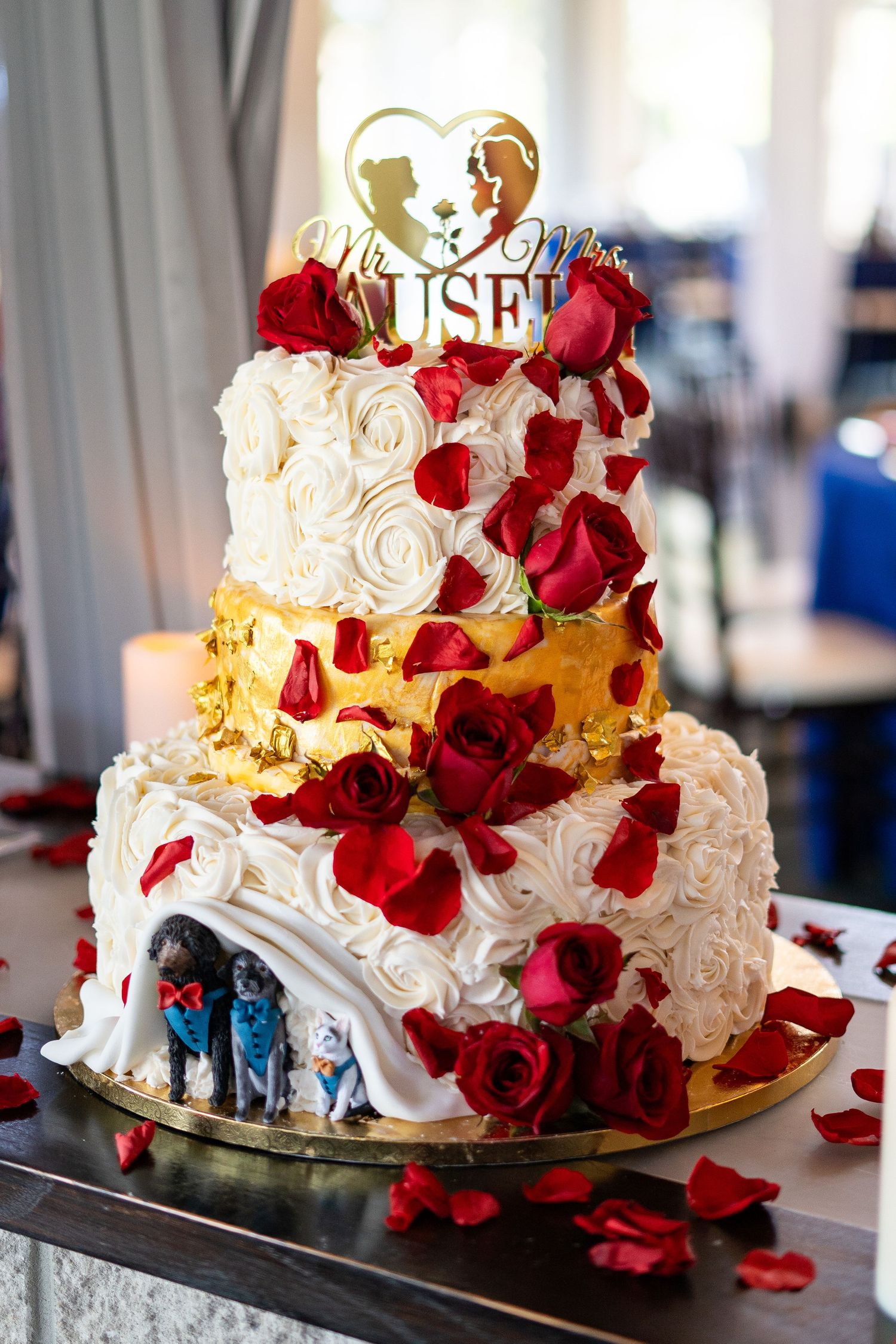 Channel Side Club in Palm Coast Florida. Wedding photography. Rose fairy tale inspired cake with custom dogs and cats peaking under icing.