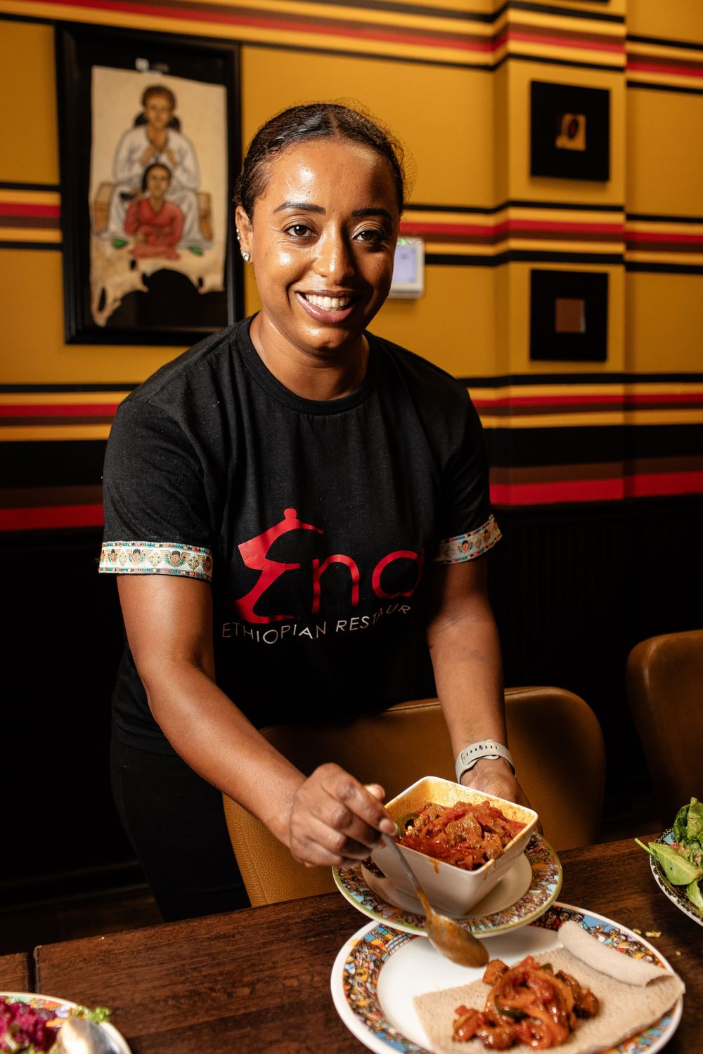 Tina Tedla of Enat Ethiopian Restaurant in Charlotte NC photographed by food photographer Jonathan Cooper
