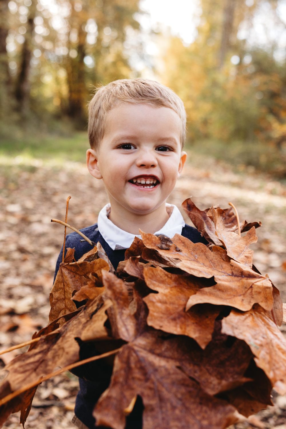 Fall family photo session in the leaves in Puyallup, Washington