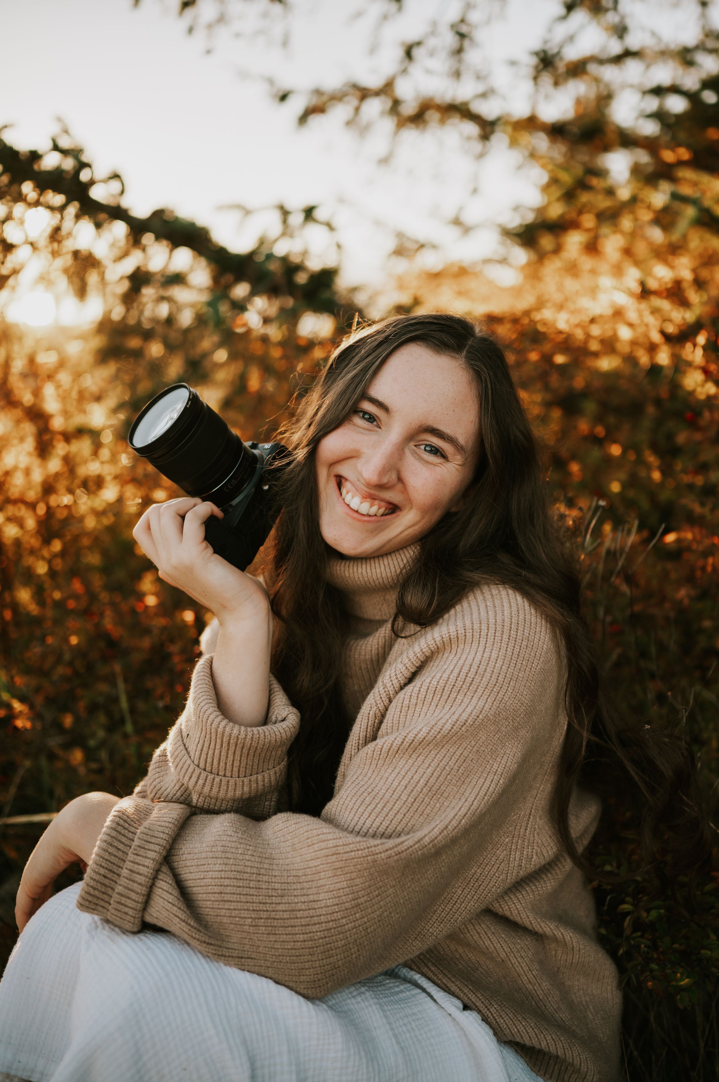 Photographer Katie Self portrait in Fall Leaves Comox Valley on Vancouver Island. Photography by Photographer Soulfull Photographs