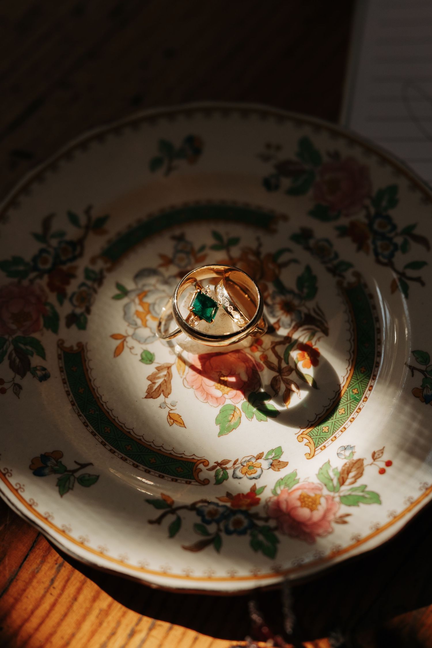 Decorative floral pattern on a vintage china plate lid shown in a series of close-up detail shots.