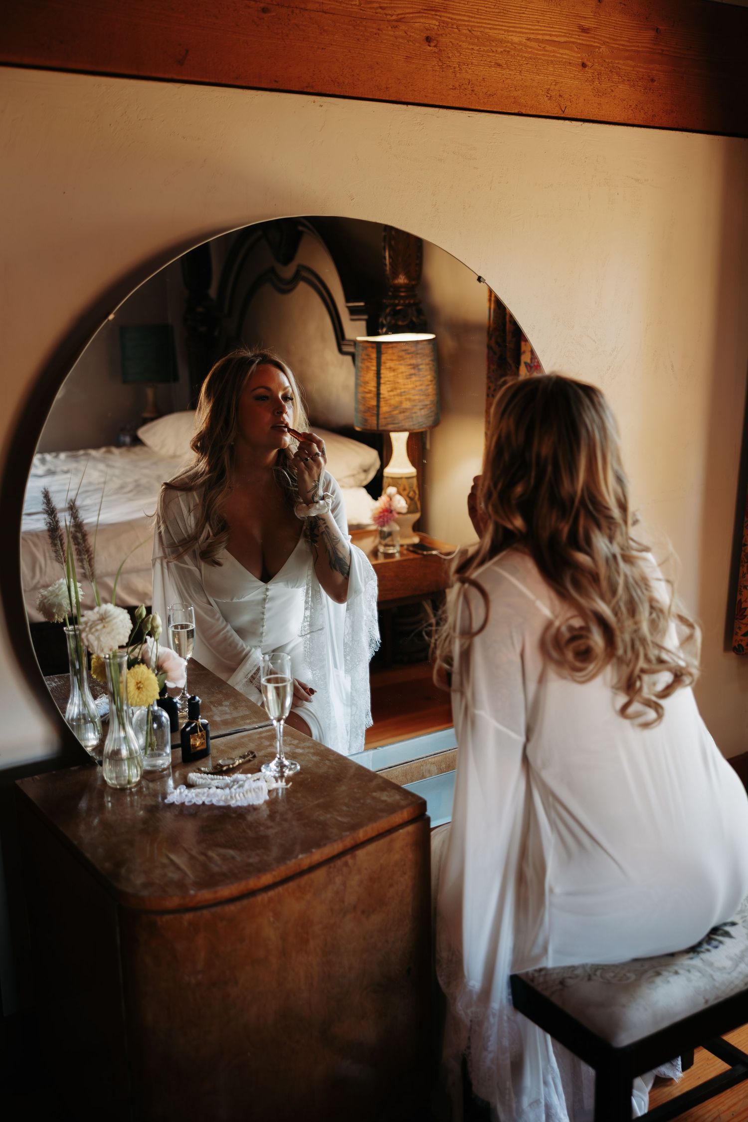 A series of six candid moments showing someone in a white robe relaxing on a brown leather couch.