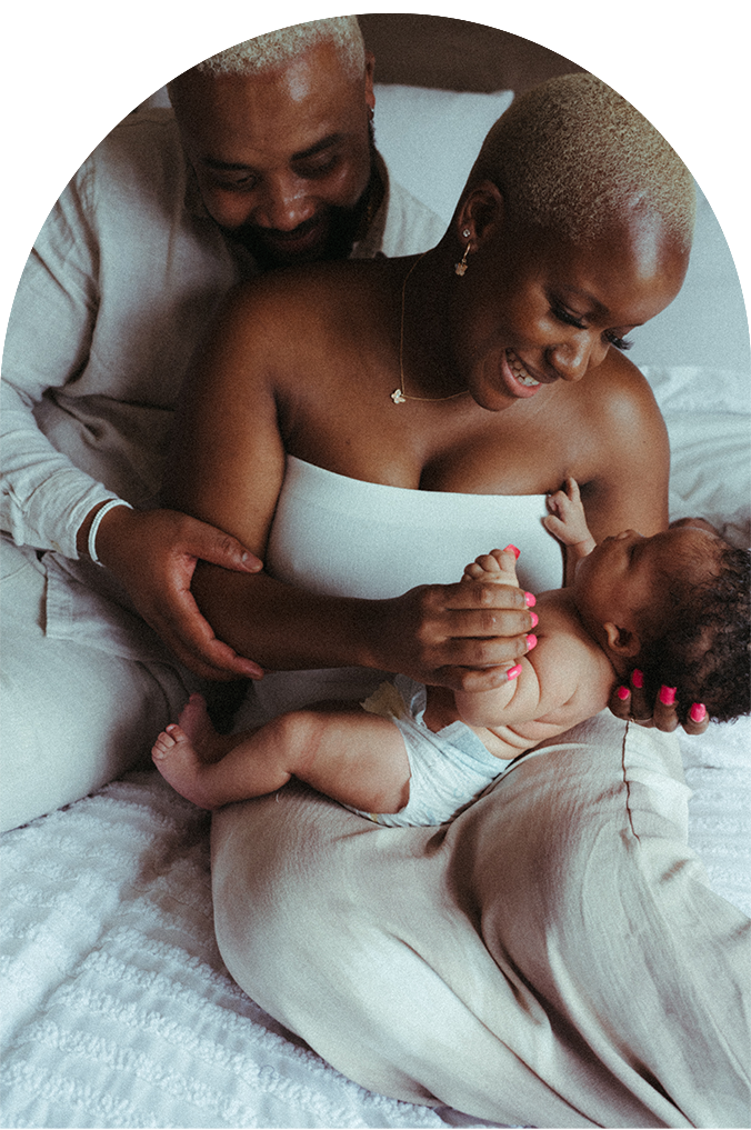 Intimate black and white photos showing tender moments between parent and child.