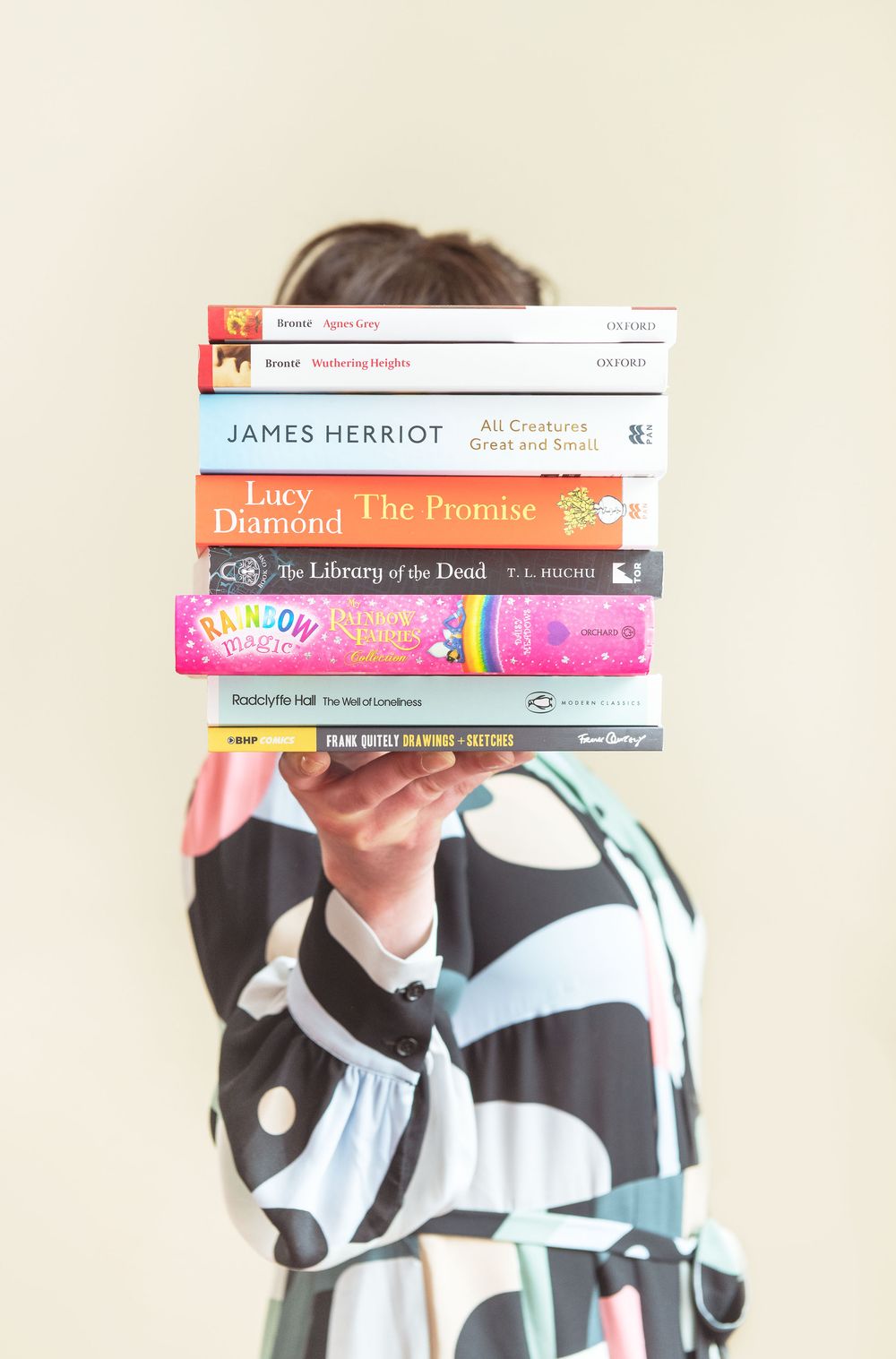 portrait of women holding books for the National Library of Scotland's pen portrait campaign in Edinburgh