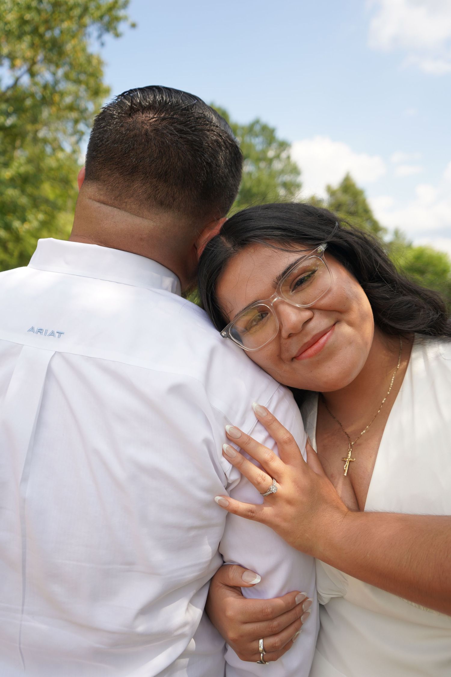 newly married couple embracing