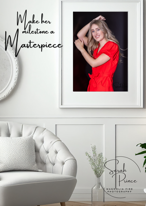 A modern gallery wall layout featuring red dress portraits and white frames against a light gray wall with elegant decor.