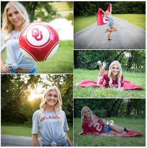 College sports themed outdoor photography session with university spirit wear and blankets on grass.