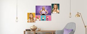 Modern photography studio interior with hanging pendant lights and wall decor.