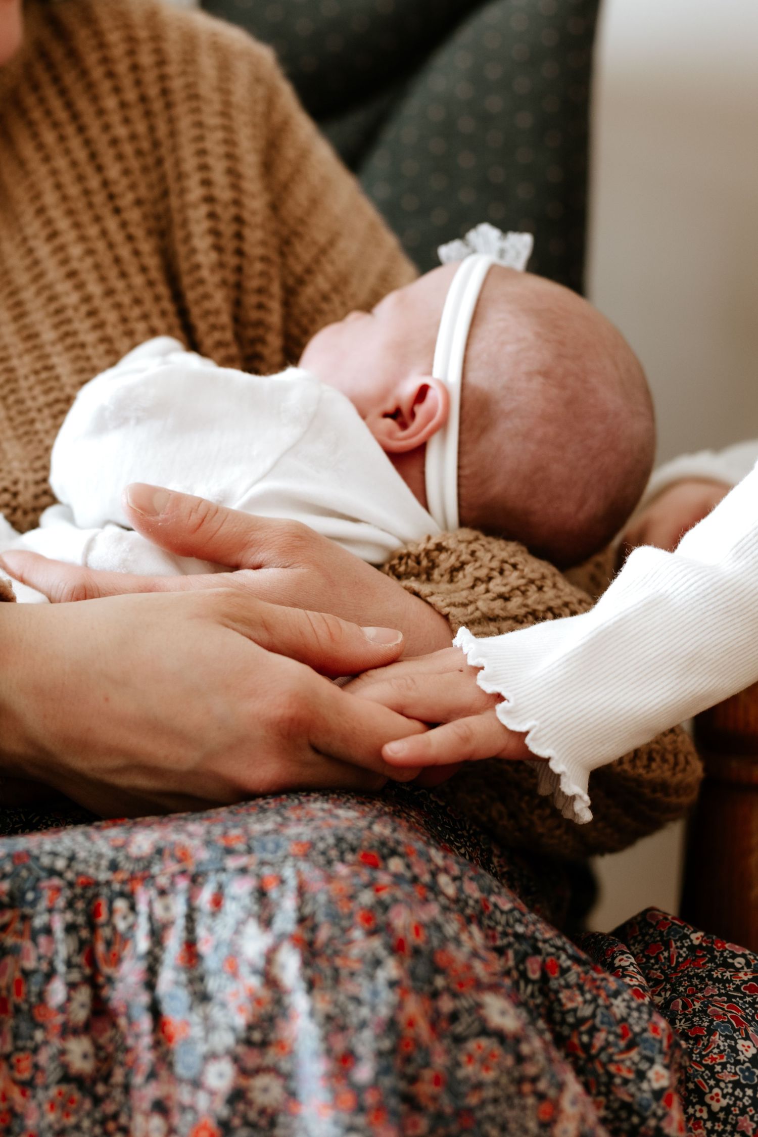 soft family moment during a newborn photoshoot