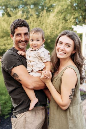 Joyful family moments captured in a series of candid outdoor portraits.
