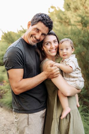 Happy family moments captured in a series of casual outdoor portraits.