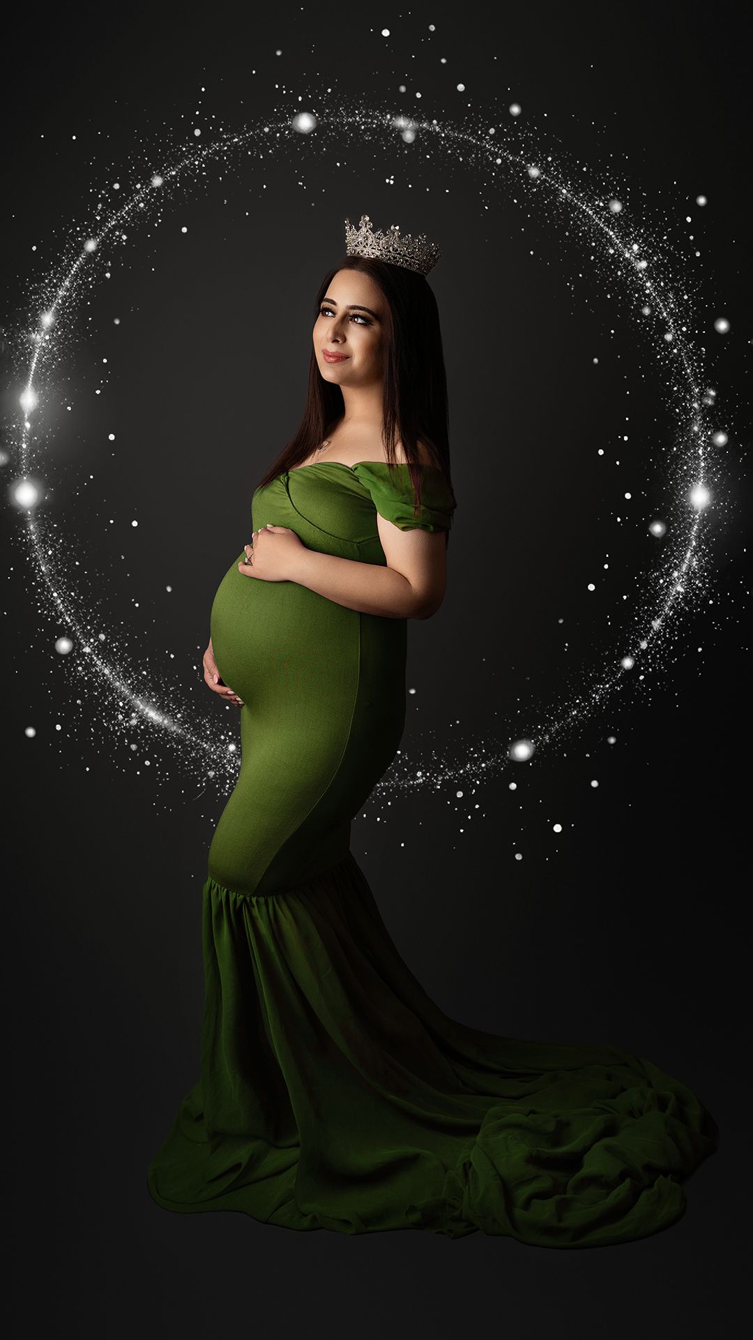 Studio maternity photoshoot in West London featuring glowing pregnant woman with soft lighting