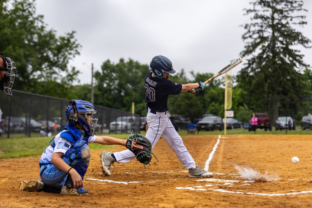 baseball batter hitting ball game action photo coverage maryland dmv suzi gibson photography