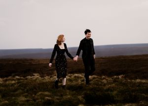 A couple wanders through the moorlands at sunset—an intimate and cinematic capture of love and adventure. Engagement, Elopement