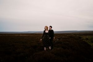 A couple wanders through the moorlands at sunset—an intimate and cinematic capture of love and adventure. Engagement, Elopement