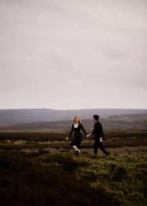 A couple wanders through the moorlands at sunset—an intimate and cinematic capture of love and adventure. Engagement, Elopement
