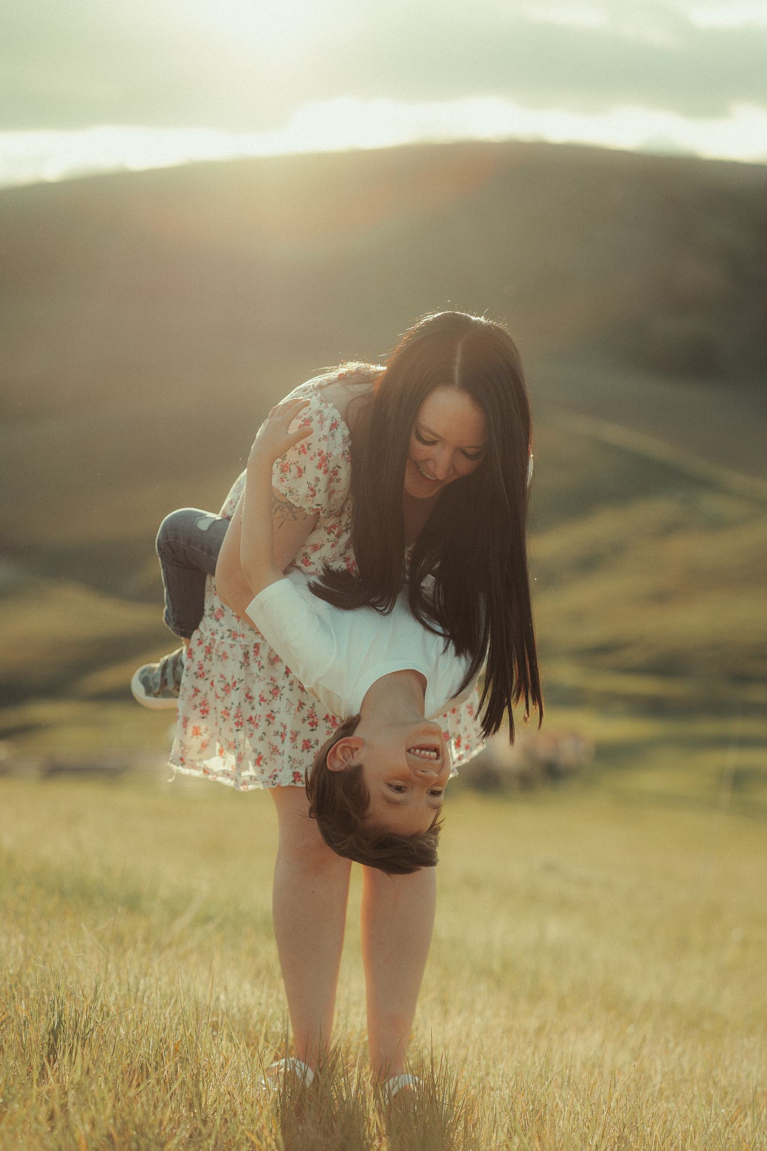A mother and son enjoying the scenic mountain range of Cache valley, UT on a fun fall family session.