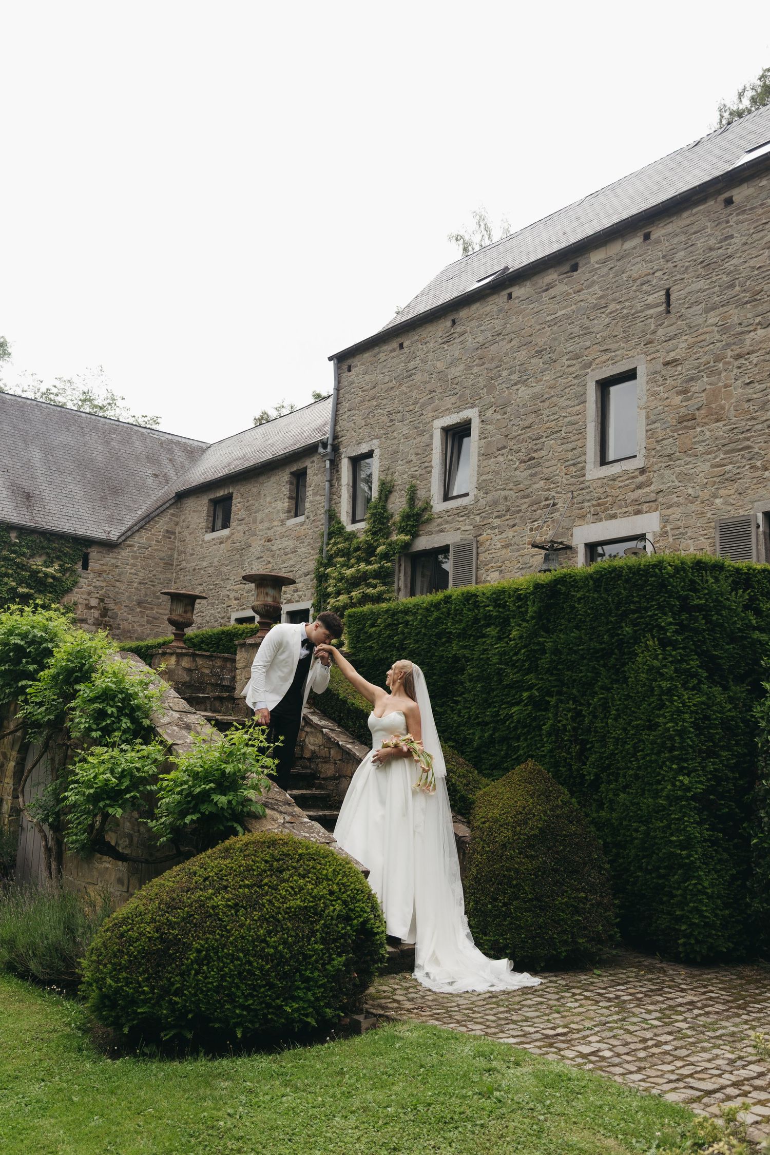 Bride and groom sharing a moment together under the sun during their destination wedding.