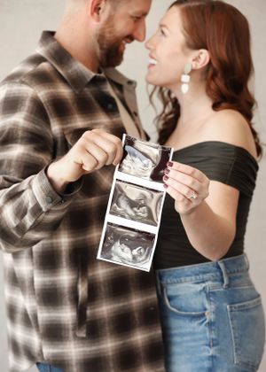 Couple sharing ultrasound photos and embracing in a series of candid moments.