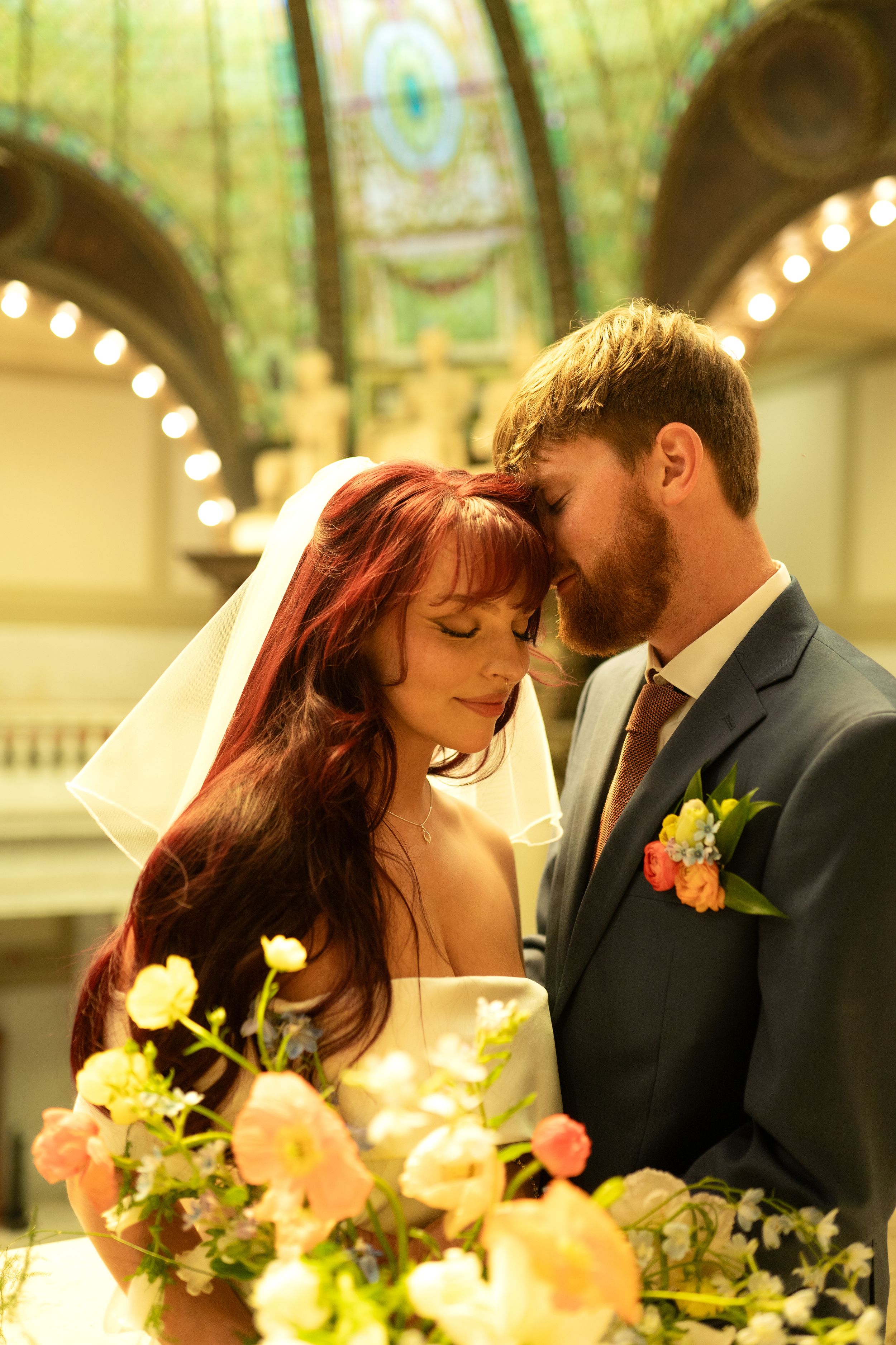 Romantic wedding sequence showing tender moments between newlyweds with floral bouquet.