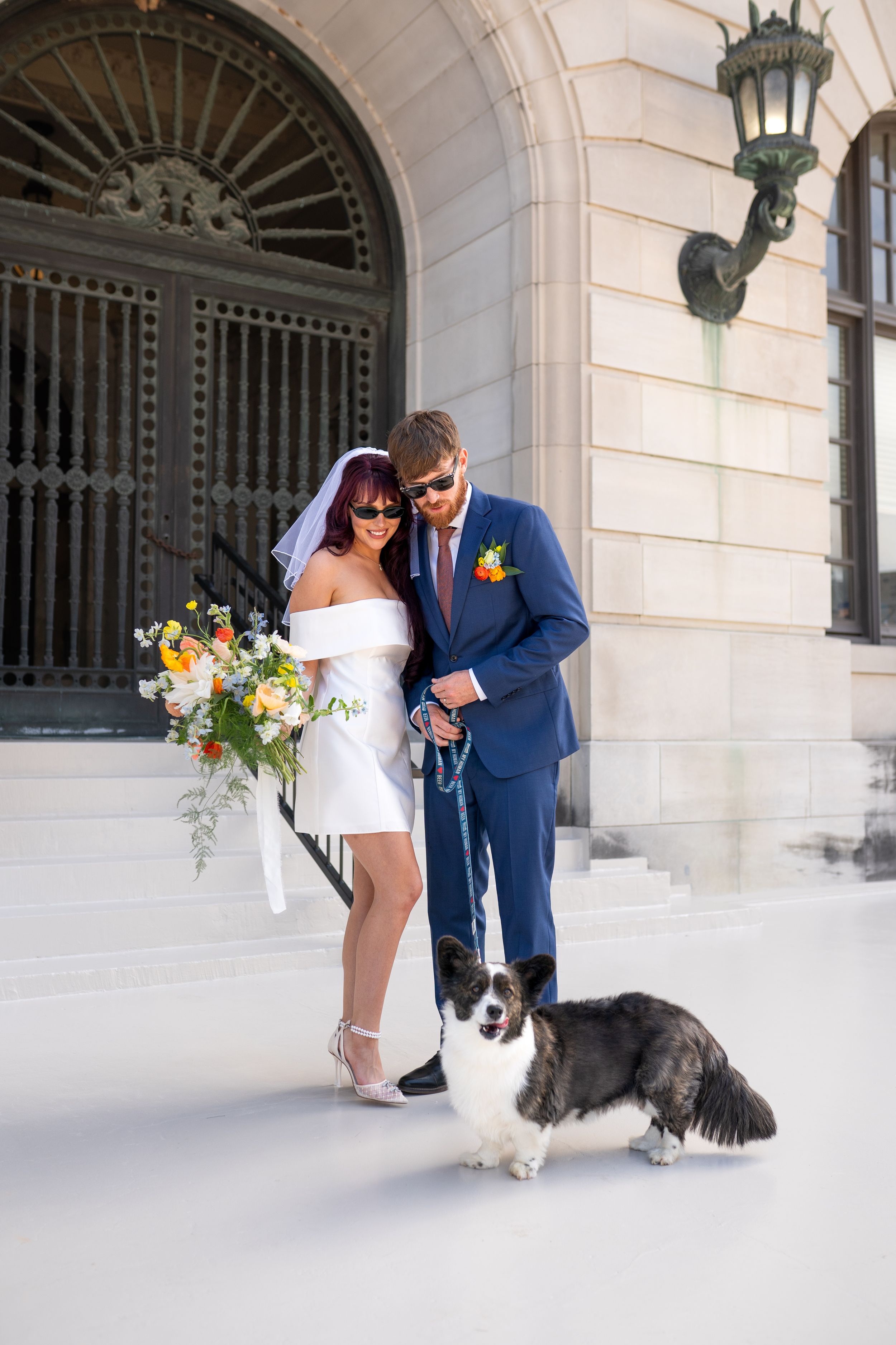 Wedding photo sequence outside classic stone building with dog companion.