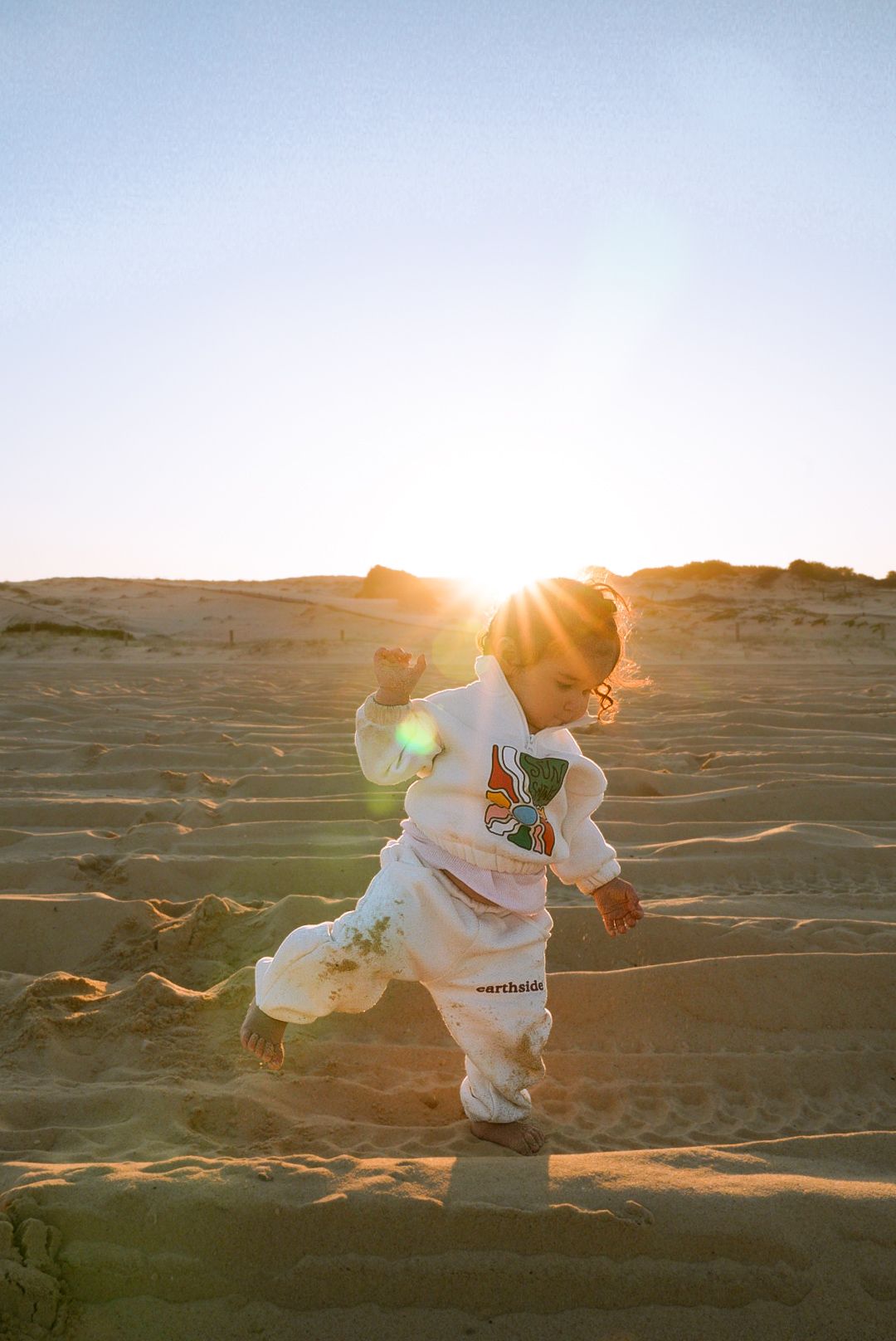 Sunset photo shoot of a toddler in Sydney.