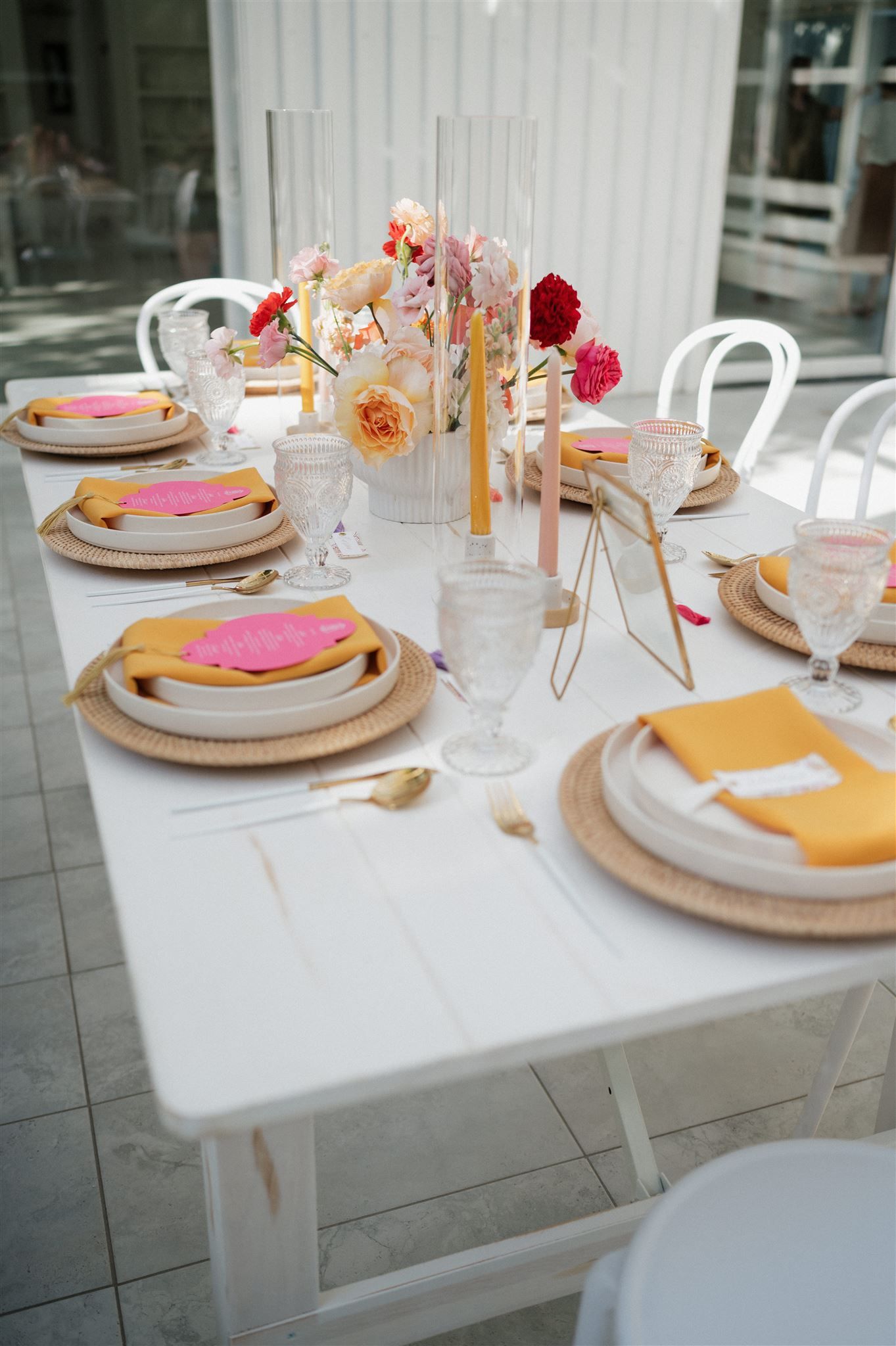 Vibrant rose wedding arrangements at The Juliana