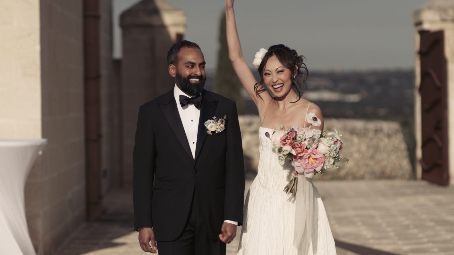 Bride & Groom smiling during their entrance