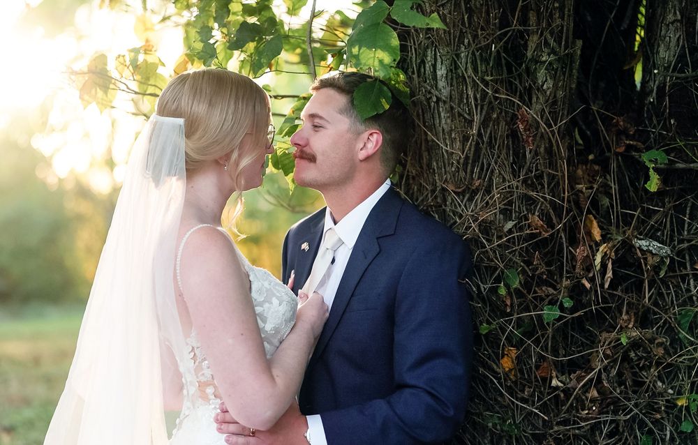 A wedding couple shares romantic moments in a series of outdoor photos against a natural backdrop.