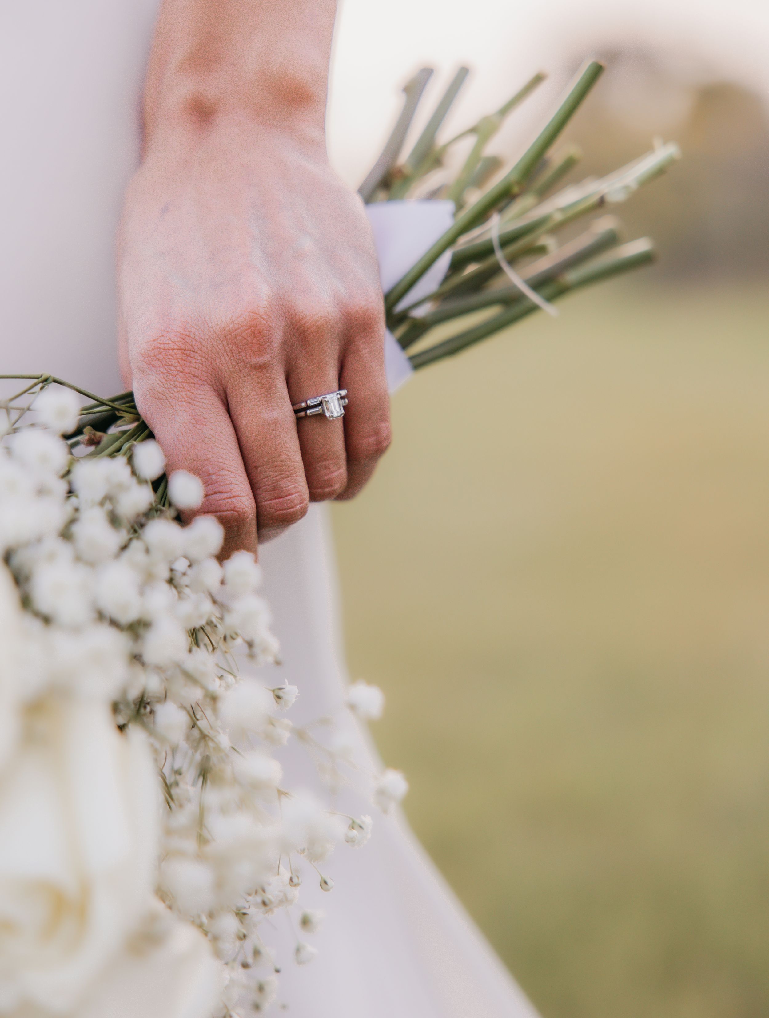 Close-up detail shot of bridal ring and bouquet during a wedding in Temple, Texas