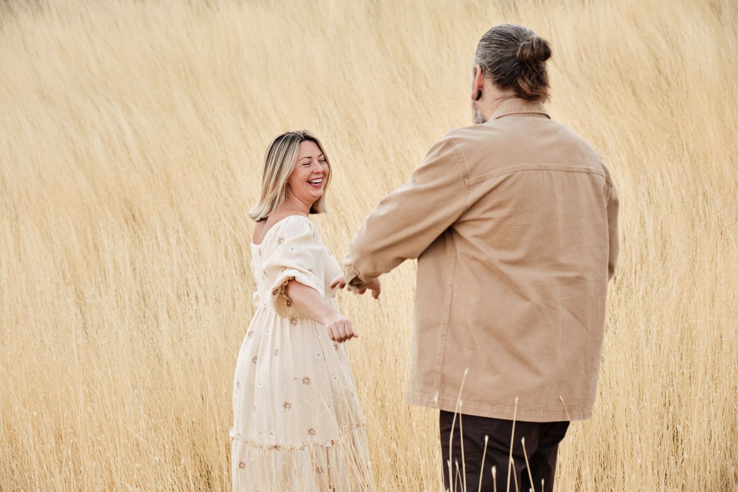 Beautiful fall photography of a couple looking at each other in love in Utah