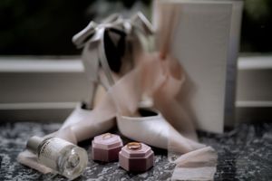 bride accessories like wedding ring, perfume,  wedding shoes