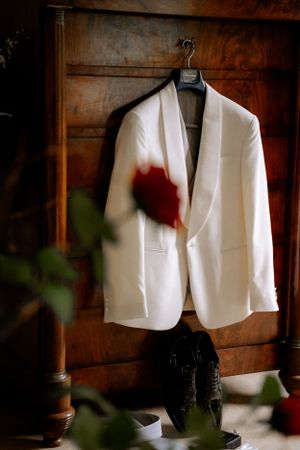 grooms clothes in a cinematic wedding photo